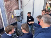 TracVac-robots in vleesvarkensstal zuigen mest automatisch weg